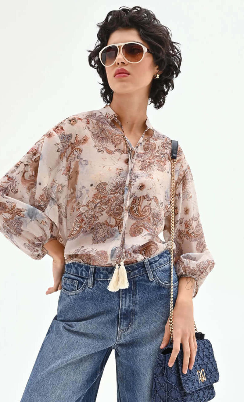 ΜΠΛΟΥΖΑ BOXY FLORAL ΜΕ ΔΕΣΙΜΟ ΣΤΟ ΛΑΙΜΟ